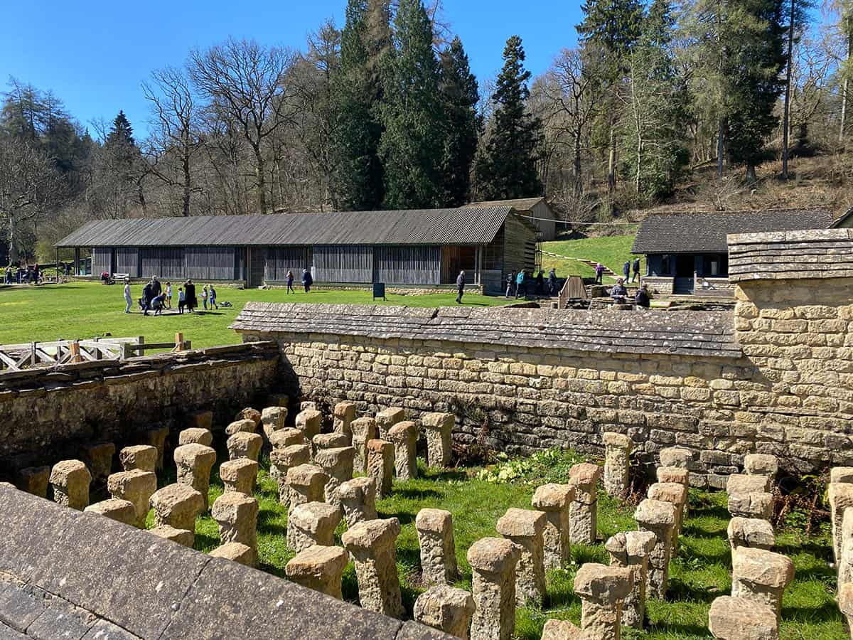 View across an exposed Roman hypocaust system at Chedworth Roman Villa in Gloucestershire