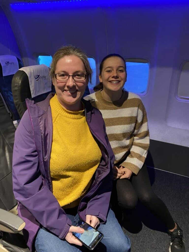 Susan and Aggie are passengers on the plane being piloted by Dom on the aviation career day 