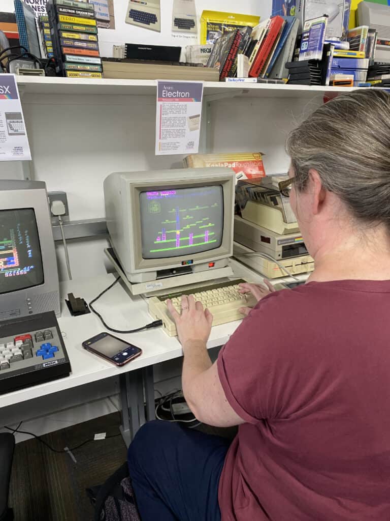 A person playing Chuckie Egg on an Acorn Electron at the North West Computer Museum in Leigh